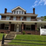 Marjorie R. Oakley, Home for Women, 509 Main St, Logan, WV 25601. Photo courtesy of Connie Baisden Marsh<br />In 1951, she won a contest for selling $50K in War Bonds. <a href="https://loganwv.us/logan-teacher-wins-war-bond-contest/">Read more.</a> <br />This home was also the previous residence of <a href="https://loganwv.us/alderson-helped-elevate-logan-to-greatness/">J. Cary Alderson</a>, who died in 1934. Photo of the former home of Marjorie Oakley and her husband, Judge Oakley. Now the Marjorie R. Oakley, Home for Women, 509 Main St, Logan, WV 25601
