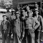 Photo of men standing in front the Kash and Karry Store at Harts Creek, Logan County, WV