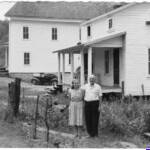 Digitally restored photo of Dave and Martha Burns standing at Crites on Buffalo Creek outside of Man - circa 1945 courtesy of Paula Solar. Note the Crites company store in the background. The location was just above the Scout Camp. It would be just past the old elementary school. Circa 1945 photo of Dave and Martha Burns at Crites on Buffalo Creek outside of Man, Logan County, WV.