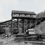 Huddleston Coal & Coke Company's tipple at Braeholm around 1915. By the 1920s, Huddleston was gone, the tipple was gone, and all coal from this facility was being funneled to the Mine No. 2 plant further west. Photo by W. R. Thurmond. Courtesy of Paula Solar. Photo of the Huddleston Coal & Coke Company's tipple at Braeholm around 1915, Logan County, WV.