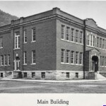 1922 photo of Triadelphia District (Man) High School, Logan County, WV.